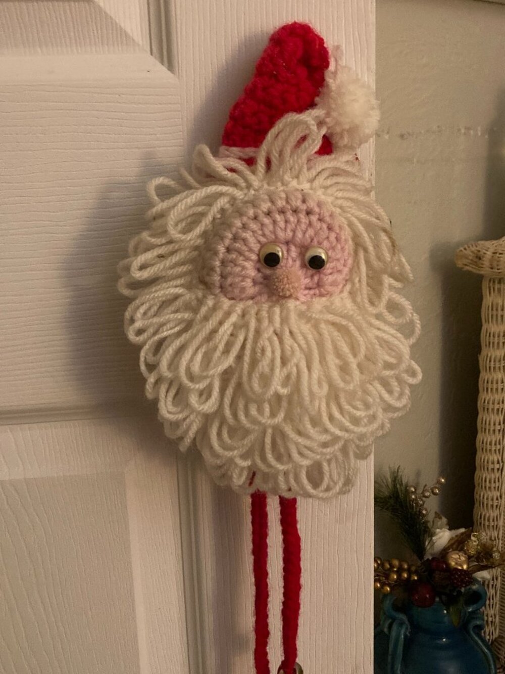 Handcrafted knit Santa doorknob hanger
